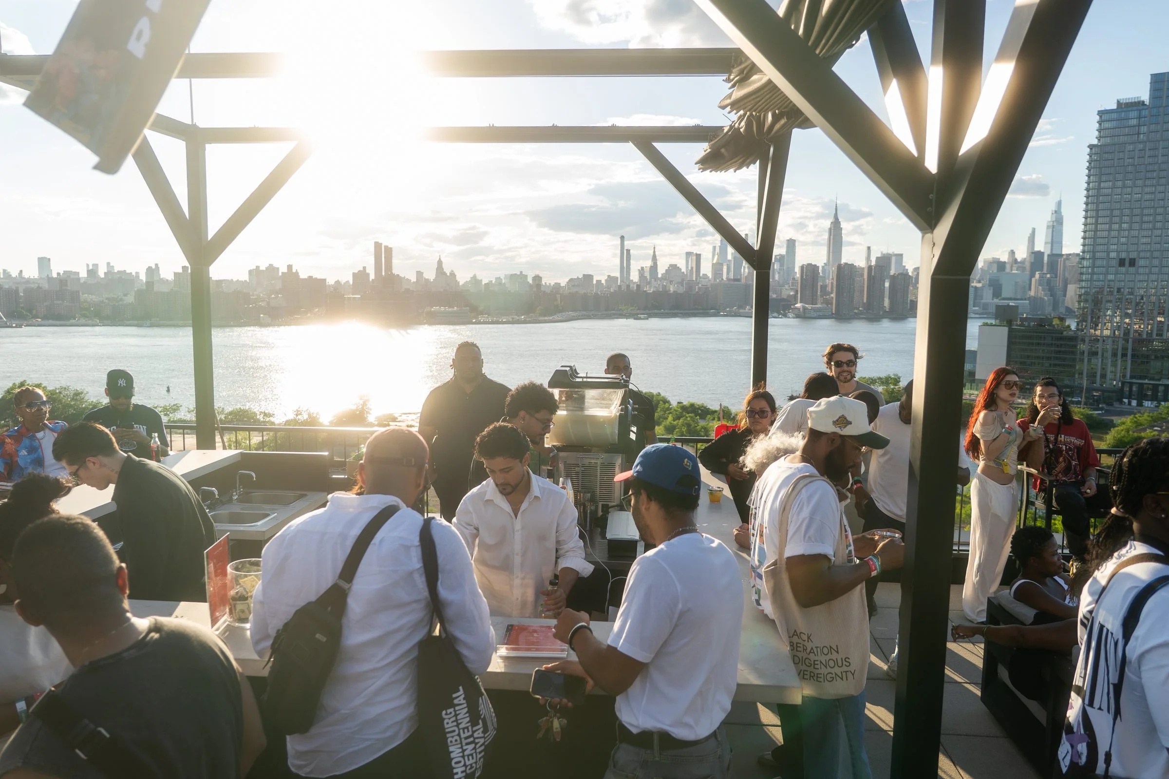 Rooftop corporate reception at sunset with the Manhattan skyline at VESPER in Brooklyn