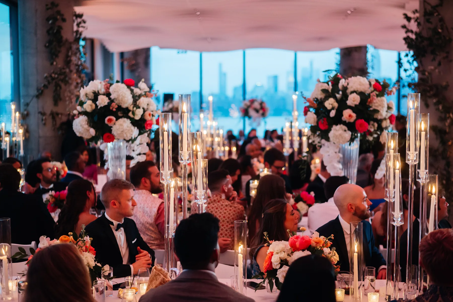 Wedding reception at VESPER in Brooklyn with elegant tablescapes and panoramic Manhattan skyline views